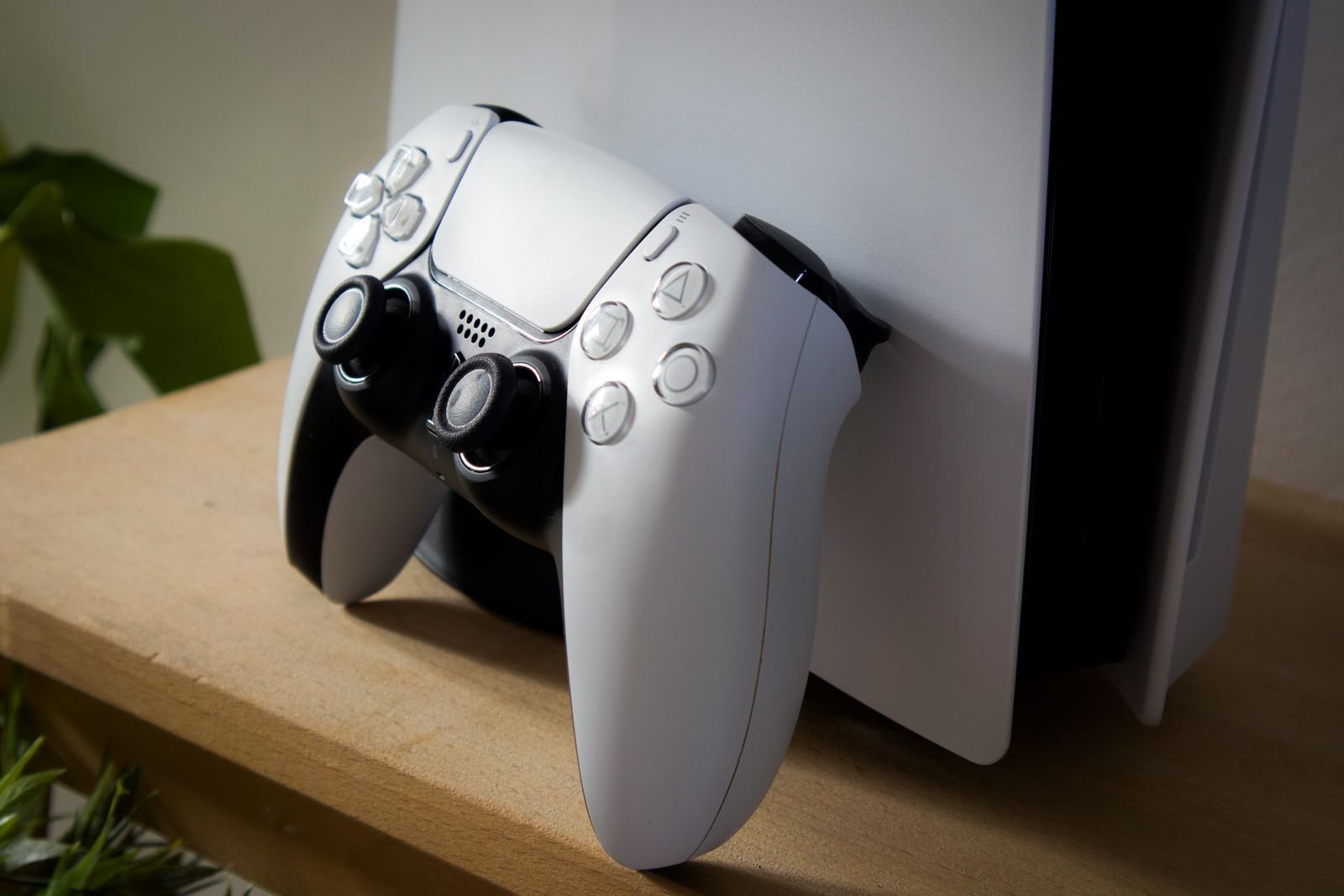 PlayStation 5 with two controllers, photo 1 of 1